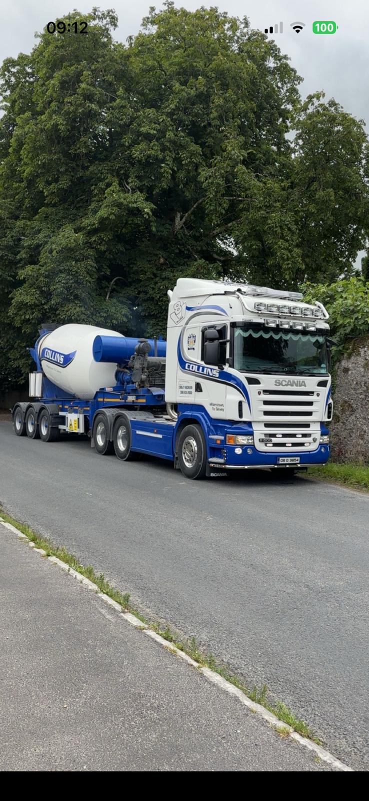 Blue and white truck and trailer