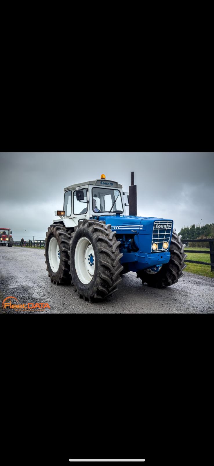 Blue and white tractor